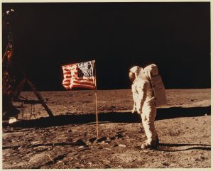 NASA · Apollo XI · Neil Armstrong, "Buzz Aldrin Standing next to the Flag", July 20, 1969 c-print on glossy fibre paper, printed in 1969, 27,6 (28,3) x 34,5 (35,2) cm, ©NASA; Courtesy: Daniel Blau, Munich