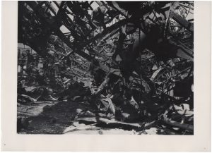 “Nagasaki, Mitsubishi Factory After 2nd Atomic Explosion”, 1945, silver gelatin print on glossy fibre paper, printed in 1945, 16,3 (18,3) x 21,3 (25,4) cm