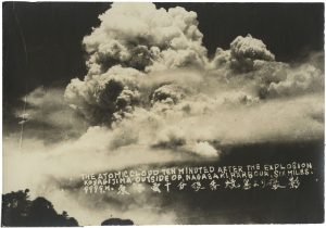 “The Atomic Cloud Ten Minutes After the Explosion Seen from Koyagi-Jima”, August 9, 1945, silver gelatin print on glossy paper, printed in 1940s, 10,2 x 14,7 cm