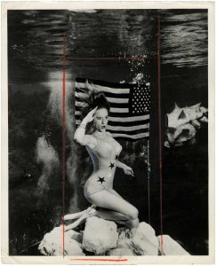 Unidentified Photographer, "Saluting Old Glory Underwater, Florida", May 25, 1965, silver gelatin print on glossy fibre paper, with gouache and crayon, 23,7 (25,4) x 19,2 (20,6) cm