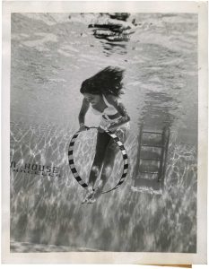 Unidentified Photographer, "Hoop-La Underwater", July 21, 1944, silver gelatin print on glossy fibre paper, printed by August 18, 1944, 20,7 (22,8) x 16,4 (18,0) cm