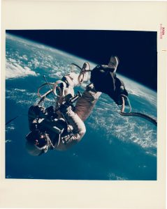 NASA · Gemini IV · James McDivitt, "Edward H. White, First American to Walk in Space ", June 3, 1965, color print on glossy fibre paper, printed c. 1965, 18,5 (20,4) x 18,2 (25,4) cm, © NASA, courtesy Daniel Blau, Munich